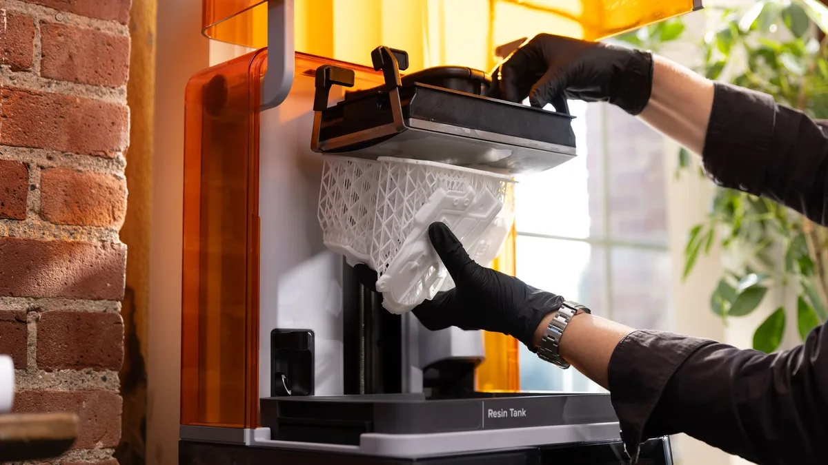 Loading a build platform into the Form Studio Wash+Cure
